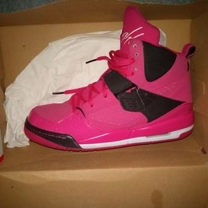 Hot pink and black Jordan flights